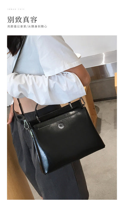 レディースバッグファッション何とでも合う大容量本革メッセンジャーバッグ斜め掛けバッグシンプルショルダーバッグ.ポシェット