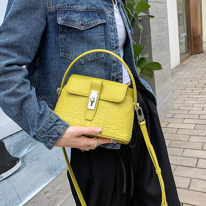 本革バッグ女性ヒツジ革レトロバケツバッグ高級感ミニショルダーバッグシンプルキャンディーカラーのハンドバッグ