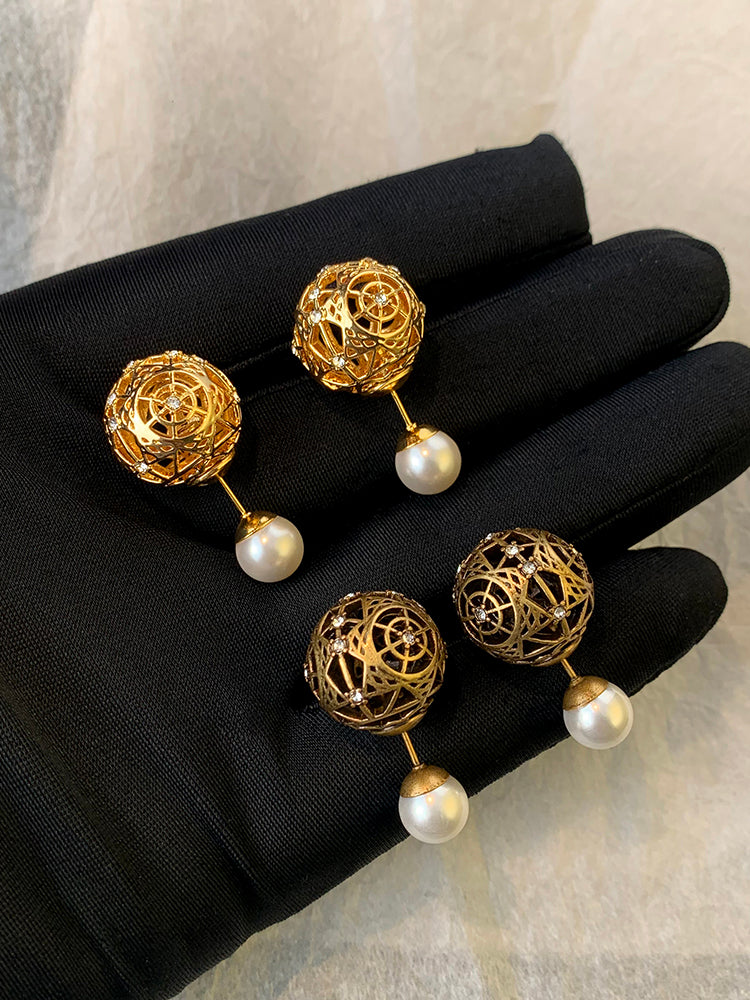 Dの小さな真珠のピアス女性の気質高級感の透かし彫りのレトロ贅沢を軽んじるイヤリング