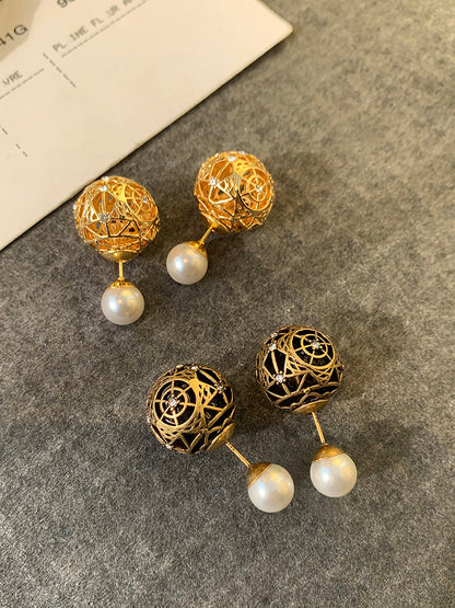 Dの小さな真珠のピアス女性の気質高級感の透かし彫りのレトロ贅沢を軽んじるイヤリング