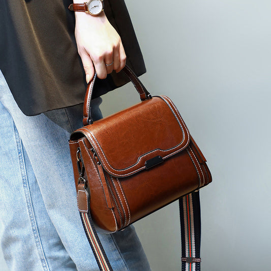 本革女性バッグファッションハンドバッグ何とでも合う斜め掛けバッグブロードバンド牛革ハンドバッグ.カバン