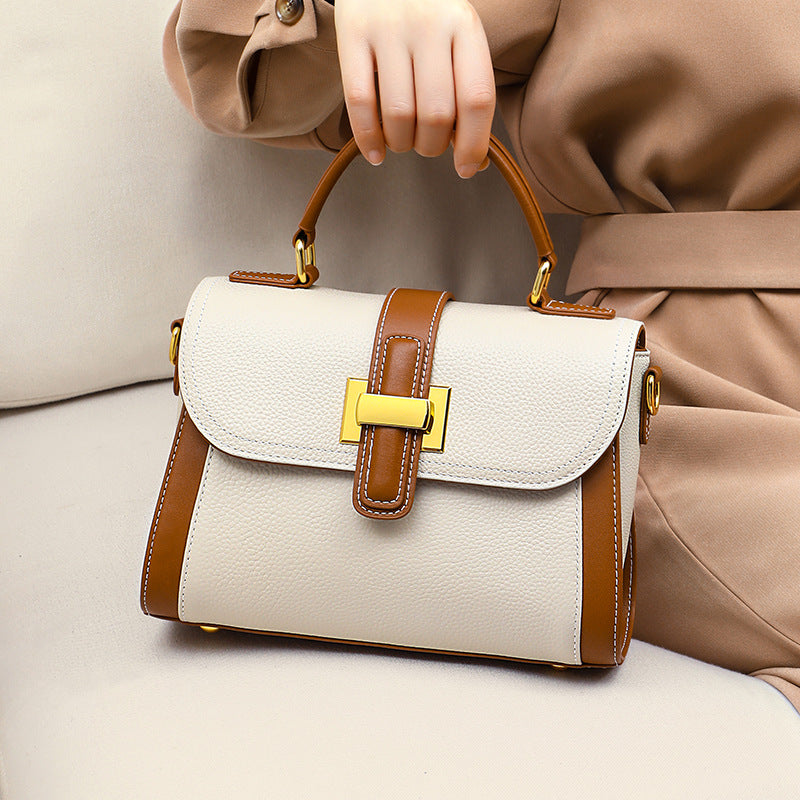 女性のハンドバッグ本革の高級感ショルダーバッグブロードバンドファッション何とでも合うハンドバッグ.カバン