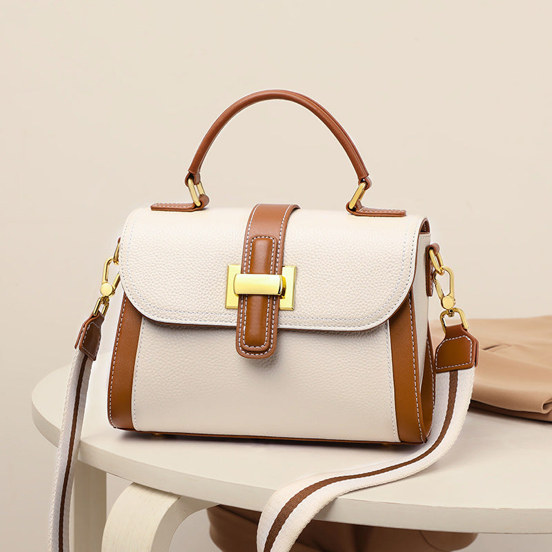 女性のハンドバッグ本革の高級感ショルダーバッグブロードバンドファッション何とでも合うハンドバッグ.カバン