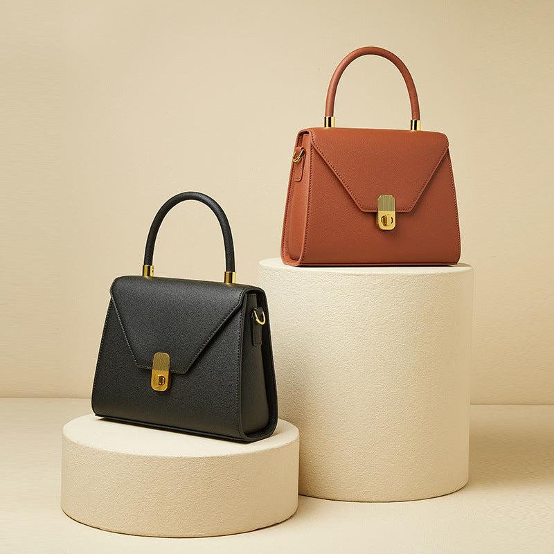 女性のハンドバッグレトロ通勤OLミニバッグ本革高級感斜め掛けバッグシンプル ハンドバッグ.カバン