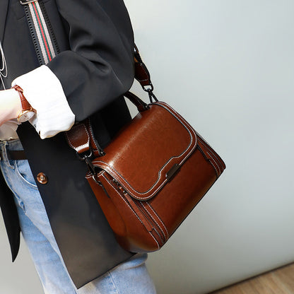 本革女性バッグファッションハンドバッグ何とでも合う斜め掛けバッグブロードバンド牛革ハンドバッグ.カバン