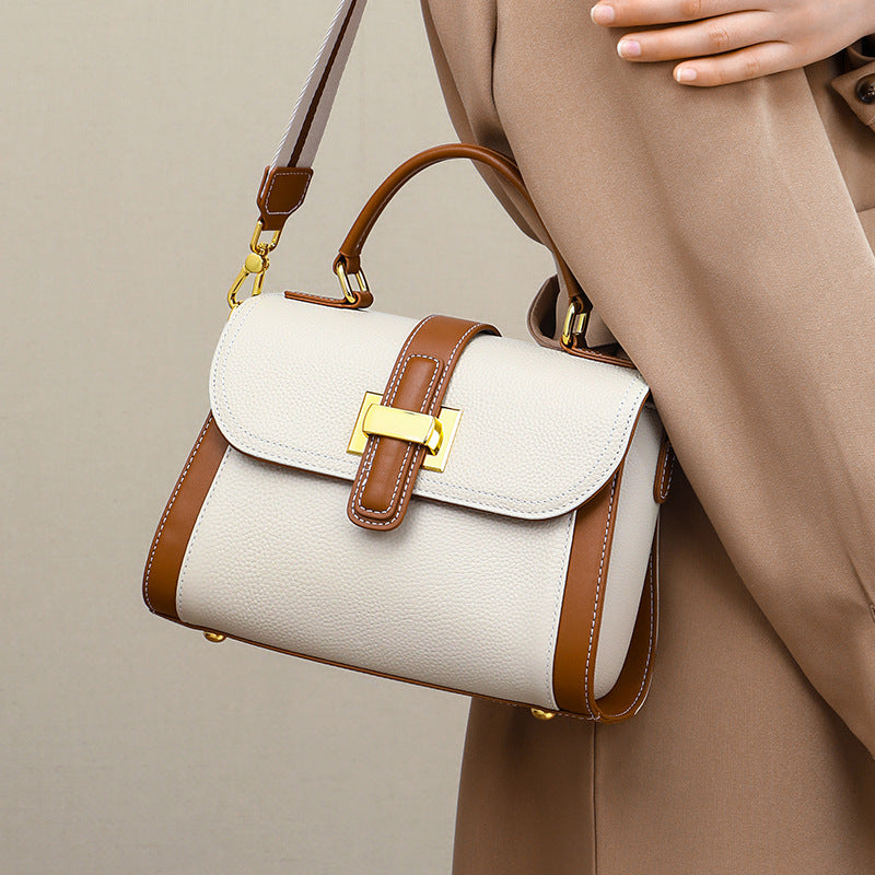 女性のハンドバッグ本革の高級感ショルダーバッグブロードバンドファッション何とでも合うハンドバッグ.カバン