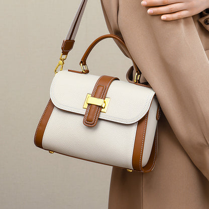 女性のハンドバッグ本革の高級感ショルダーバッグブロードバンドファッション何とでも合うハンドバッグ.カバン