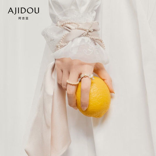 AJIDOU乙女の組み合わせパールフラワーリング柔らかでエレガントな指輪贈り物