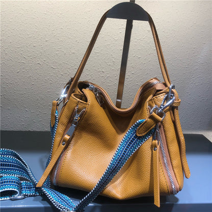 牛革カジュアル女性用バッグソフト牛革ロングラインバッグライチ柄ジッパー暗袋ハンドバッグ