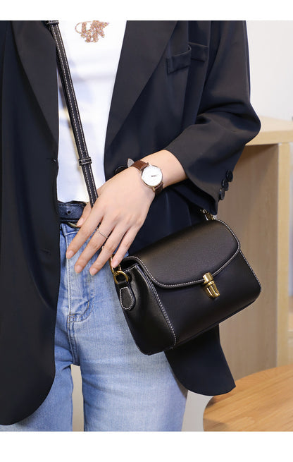 本革のレディースファッション シンプルな斜め掛けバッグトランペットバッグ牛革ショルダーバッグ.ポシェット