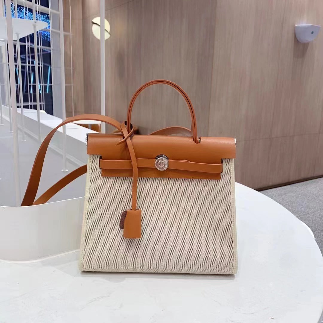 大容量通勤バッグ高級感のサドルバッグハンドバッグファッションコントラストカラーショルダーバッグ女性