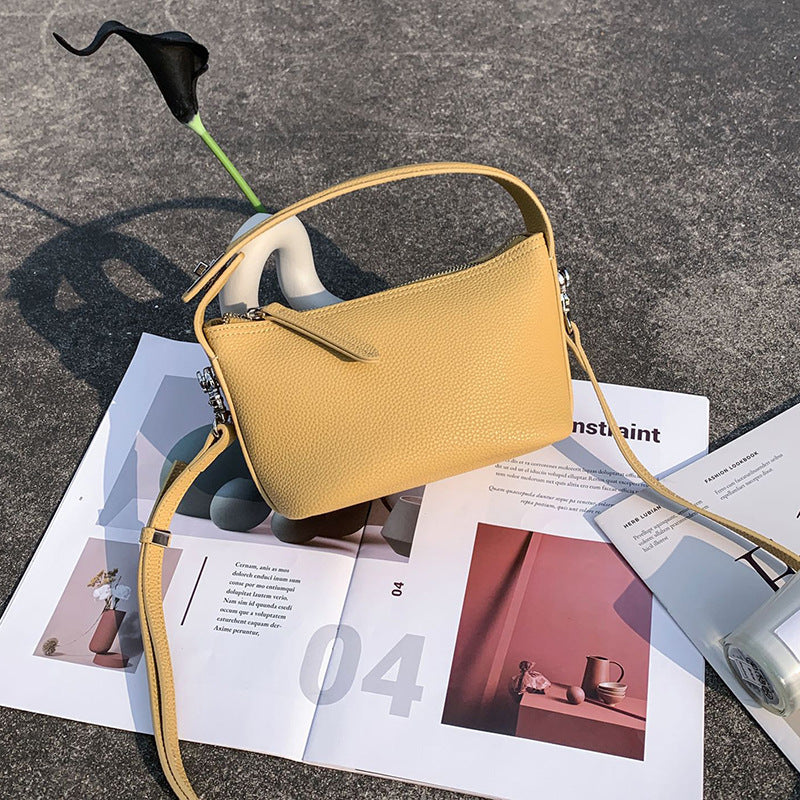 女性のわきの下バッグ手提げショルダーバッグカジュアルファッションシンプル本革斜め掛けバック 何とでも合う