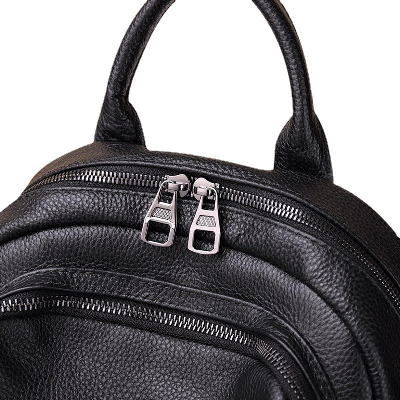 ブラックバックパック大容量カジュアルヘッドレイヤー牛革バックパック手提げ可能ショルダーバッグ