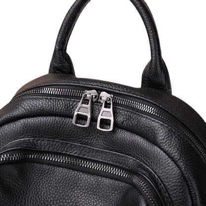 ブラックバックパック大容量カジュアルヘッドレイヤー牛革バックパック手提げ可能ショルダーバッグ